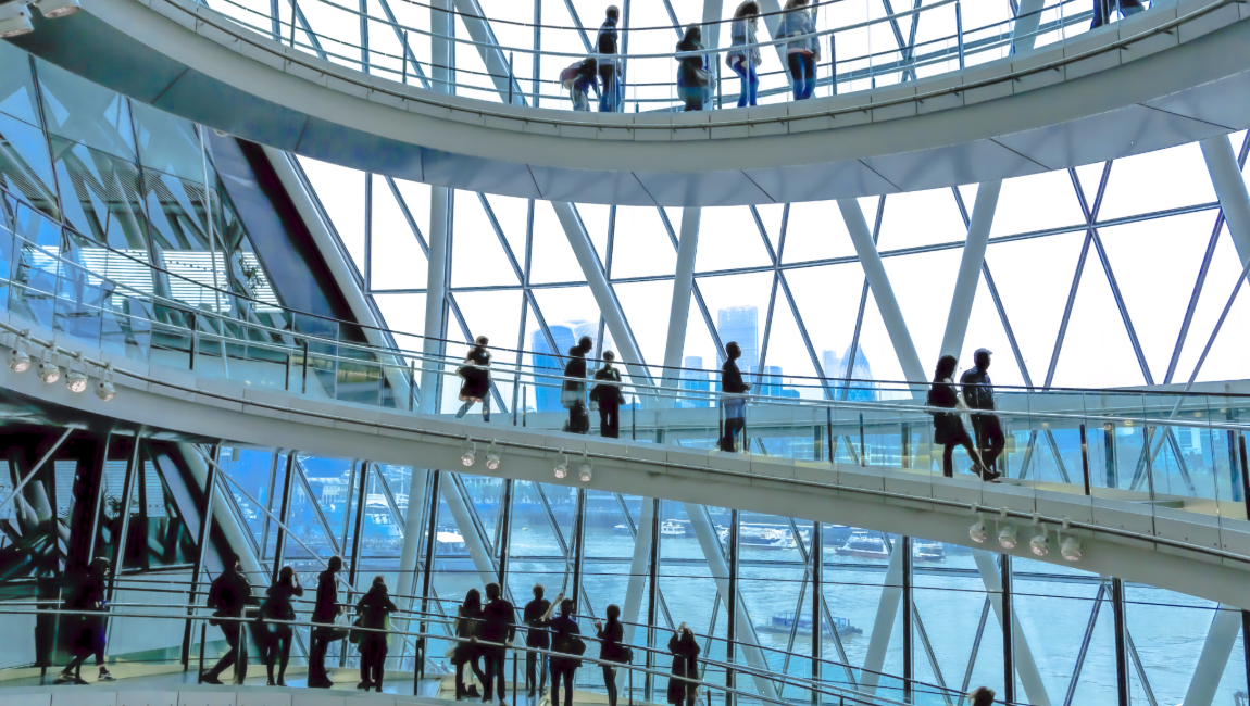 People walking on modern staircase at London's City Hall