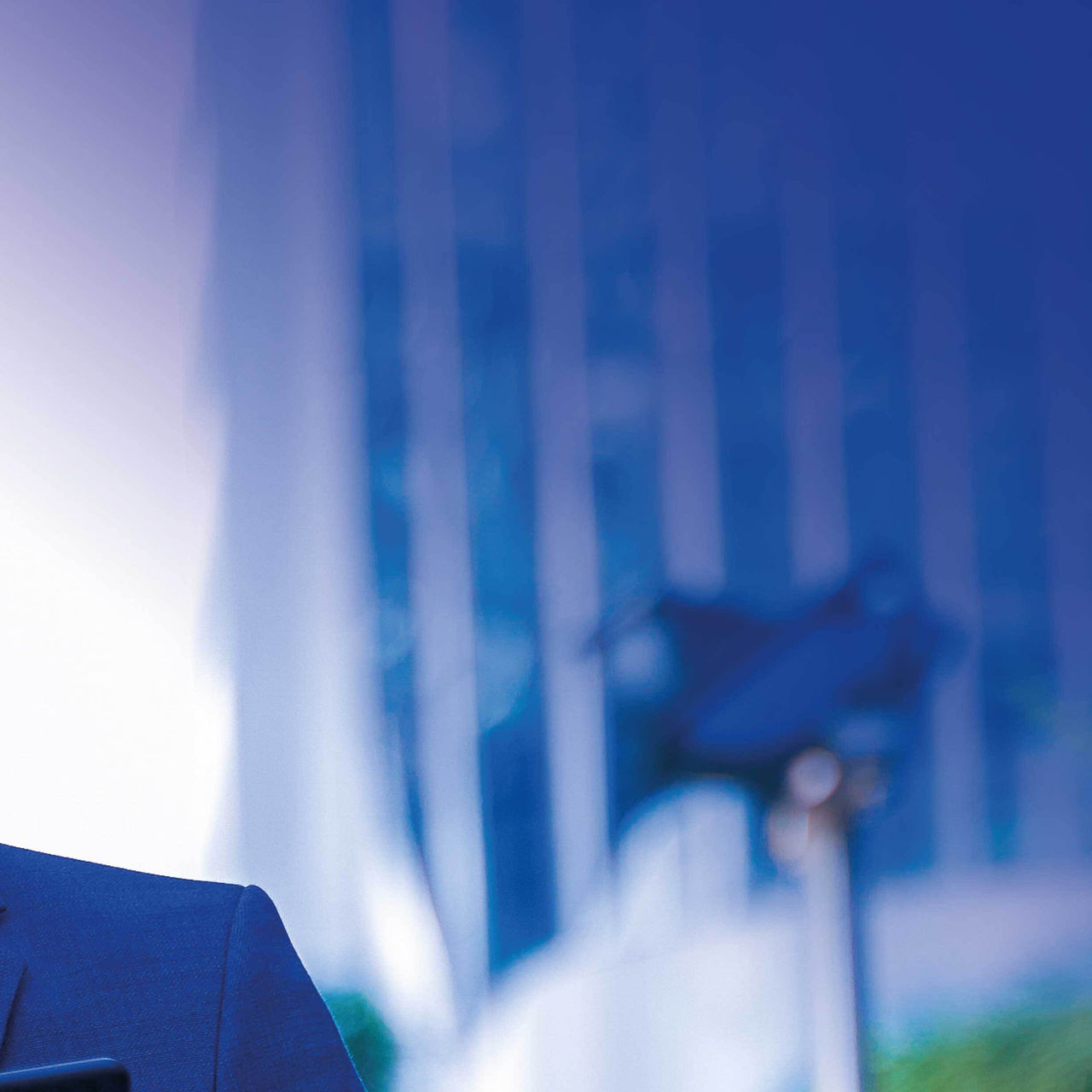 Continuation of the image man looking at cell phone